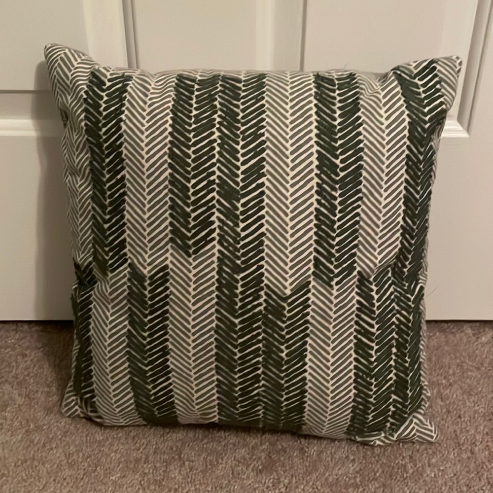 Grey decorative pillow. Never used. Smoke free home.